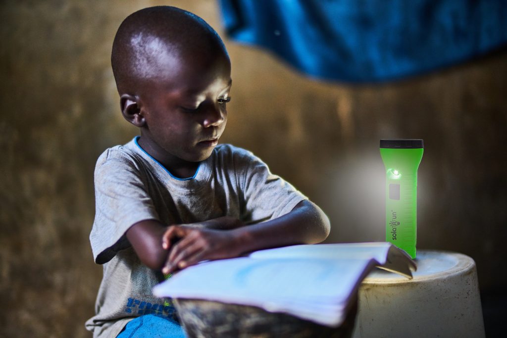 1920_littleboystudying-naturallightsolarlamp-copyrightveluxgroup-1024x683